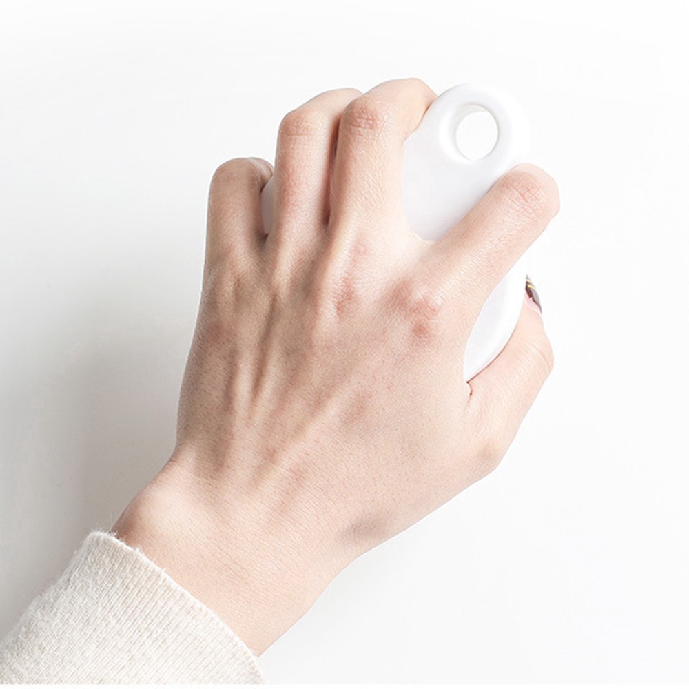 Lược mát xa da đầu mini cầm tay bằng silicon tiện dụng