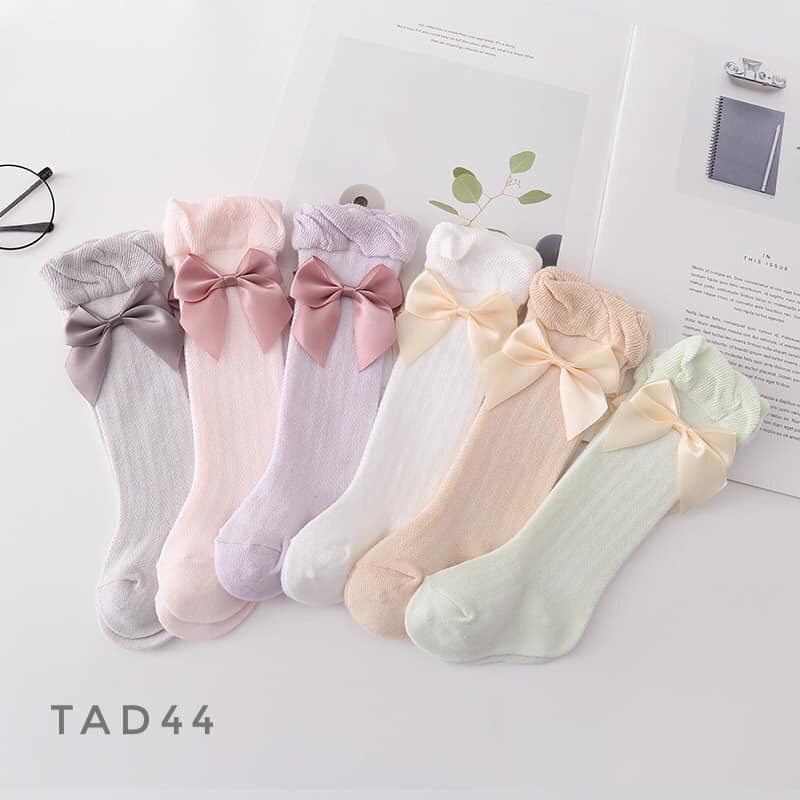 Tất lưới đùi đính nơ cho bé gái TAD44