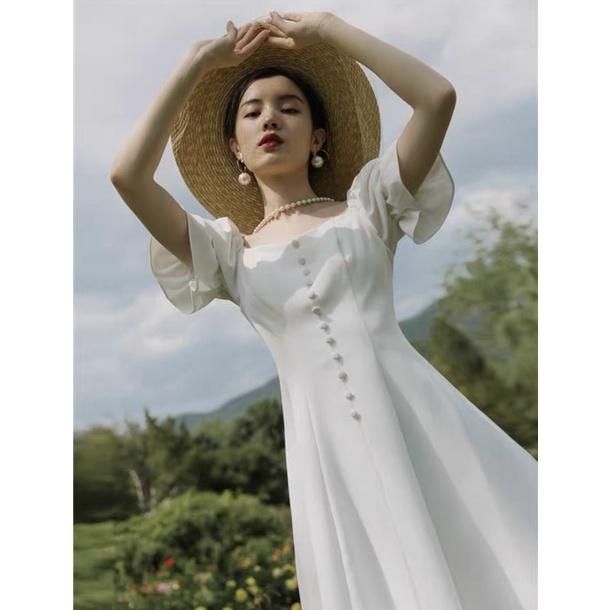 Váy trắng cổ bẻ tay nhún bèo dáng xoè, phong cách vintage - Từ tiệm váy nàng Thị | BigBuy360 - bigbuy360.vn