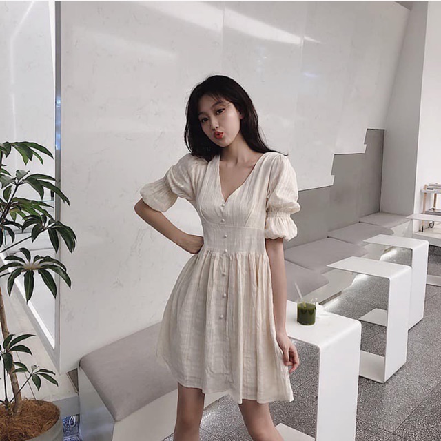 Đầm nút bọc tay phồng