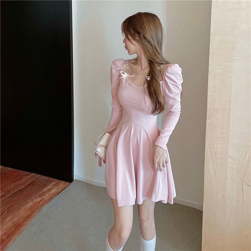 Long sleeved dress women's autumn decoration body temperament short skirt with thin waist and bow design sense, small and fluffy skirt