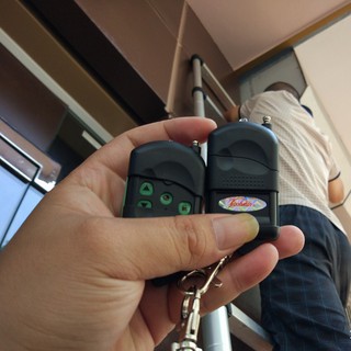 Remote cửa cuốn YH-1AA