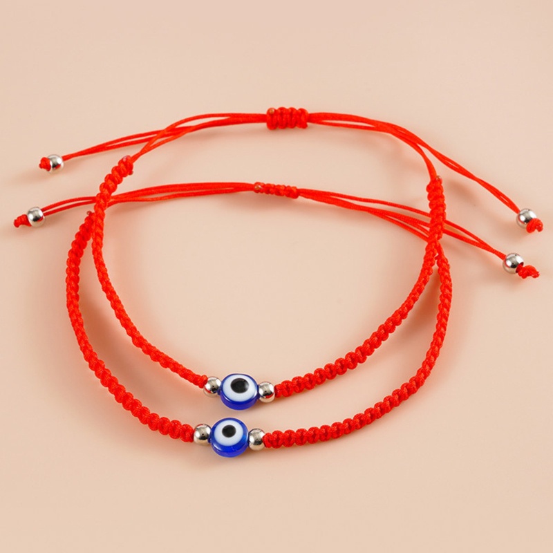 Set 2 Vòng Tay Chuỗi Hạt Màu Đỏ / Đen Hình Mắt Quỷ Thời Trang Cho Tuổi Teen