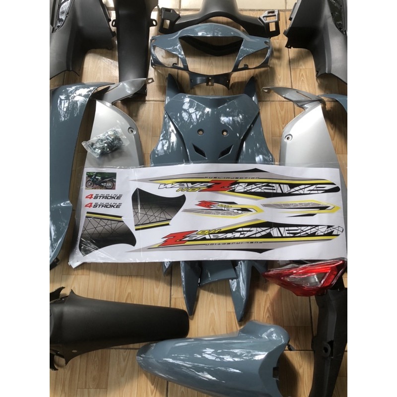 Dàn áo RS màu xi măng tặng kèm đèn lái ,tem và ốc áo xe  nhận sơn theo yêu cầu của khách hàng