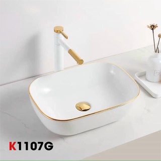 Chậu lavabo trắng viền vàng