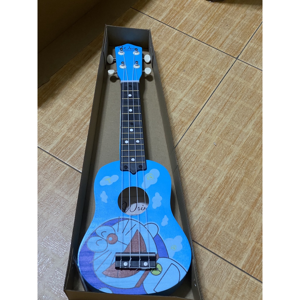 Đàn Ukulele Soprano Hoạ tiết Hoạt Hình Woim tặng kèm hấp dẫn