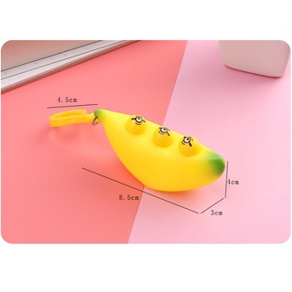 Móc khoá squishy quả chuối bóp ra mặt cười