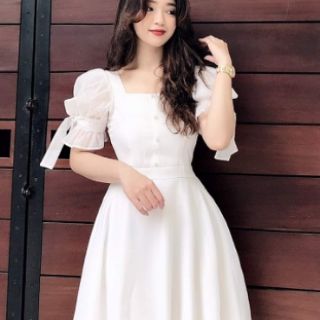 Váy trắng tay bồng đính nơ tiểu thư