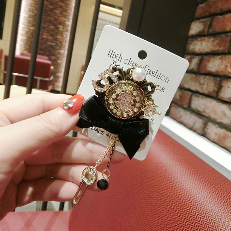 Ghim cài áo hình nơ đính đá thiết kế sang trọng cho nữ