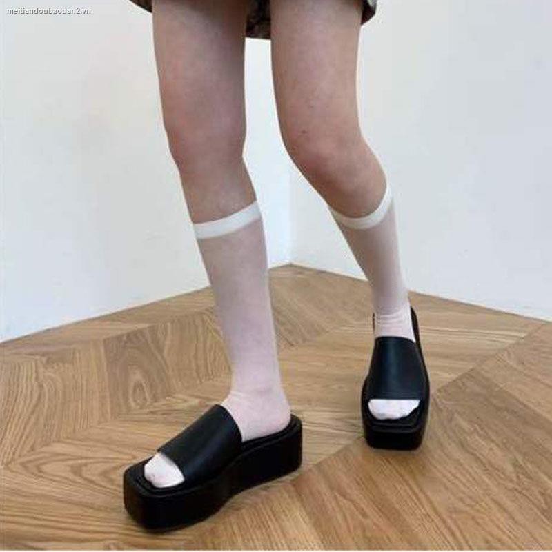 Black wedge platform flip-flops