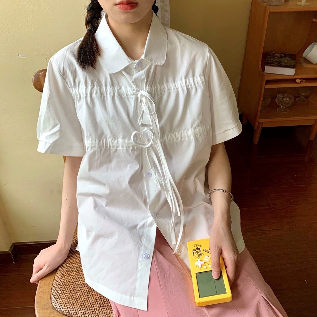 Áo sơ mi nữ dáng rộng phong cách Hàn Quốc mới dễ phối đồ | BigBuy360 - bigbuy360.vn