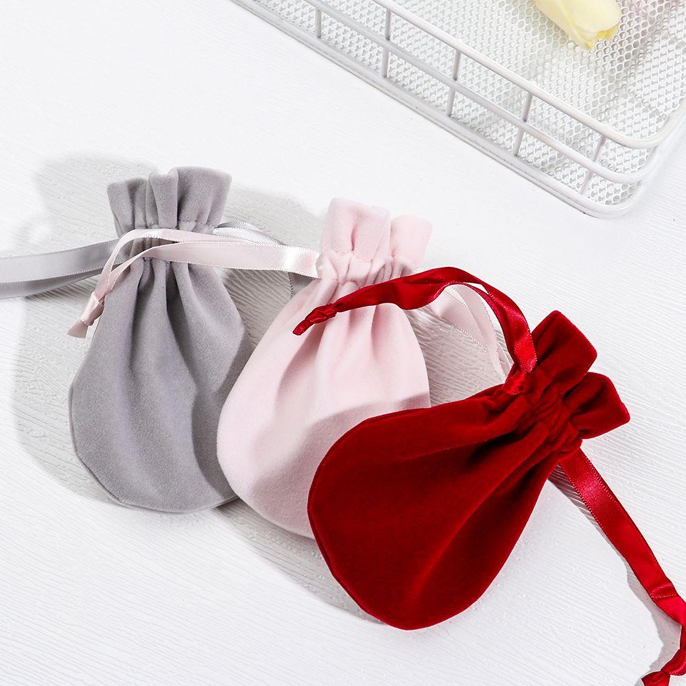 Túi Nhung Tròn Đựng Đồ Chống Bụi Tiện Dụng