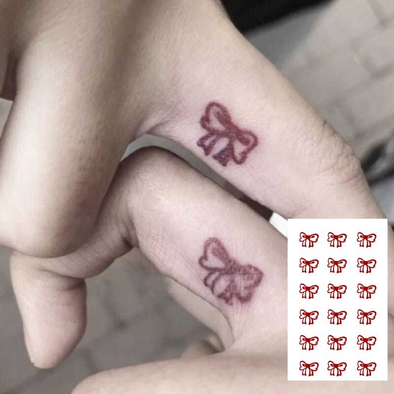 Hình xăm dán nơ ngón tay dễ thương mô hình nhỏ không thấm nước lâu dài dán hình xăm cá tính