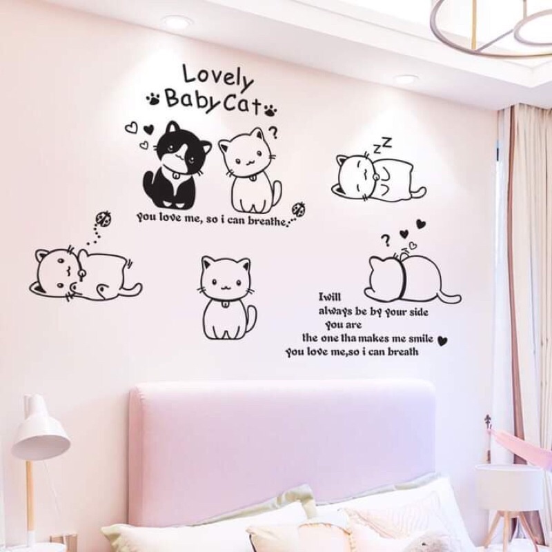 Decal dán tường mèo cute và cửa sổ ghế đá.