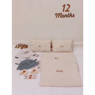 Gối ruột liền thêu tên cho bé