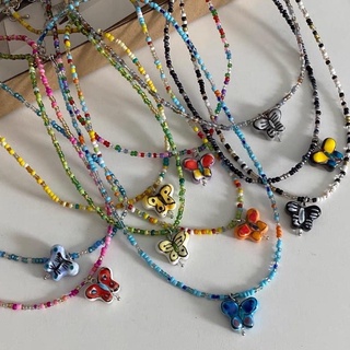 Vòng cổ hạt cườm charm bươm bướm