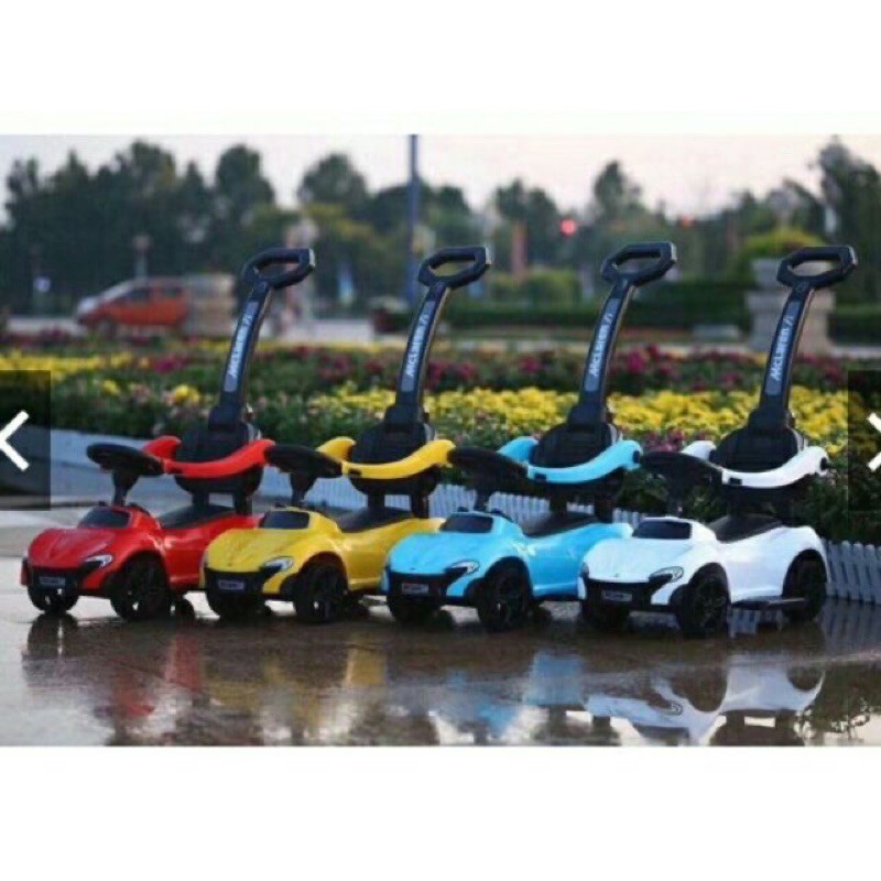 Xe ô tô xe chòi chân có  cán đẩy có nhạc bảo hiểm