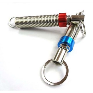 Lò xo bật mở cốp xe ô tô