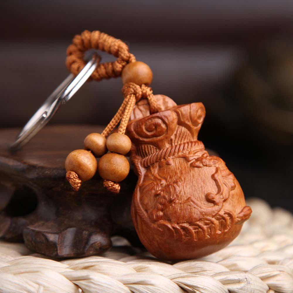 Móc Khóa Mặt Gỗ Đào Chạm Khắc Hình Phật May Mắn