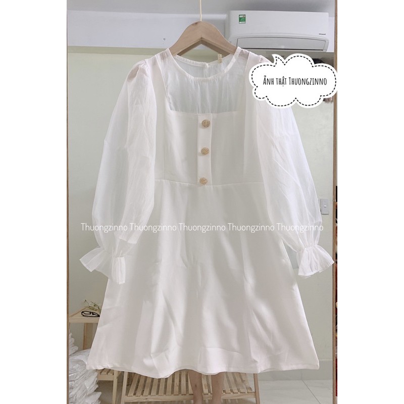 Đầm trắng cúc ngọc sang chảnh phối voan tay bồng