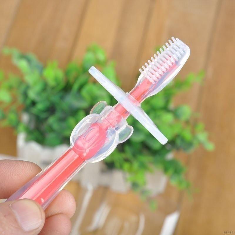 Bàn chải silicon làm sạch răng cho bé