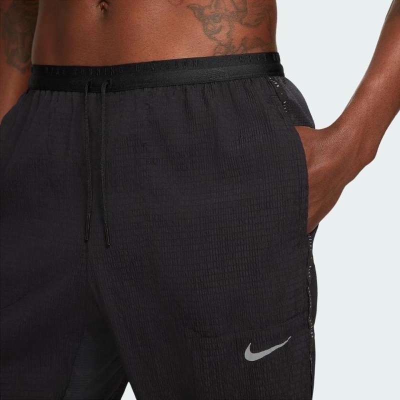 Quần nike running division