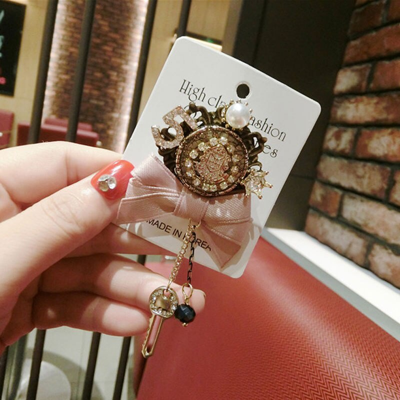 Ghim cài áo hình nơ đính đá thiết kế sang trọng cho nữ