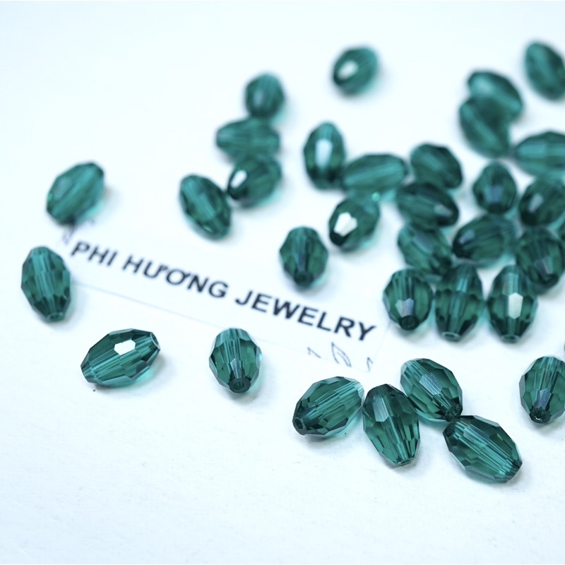 Gói 25 hạt cườm hình thoi 6x8mm đính áo, xỏ vòng tay
