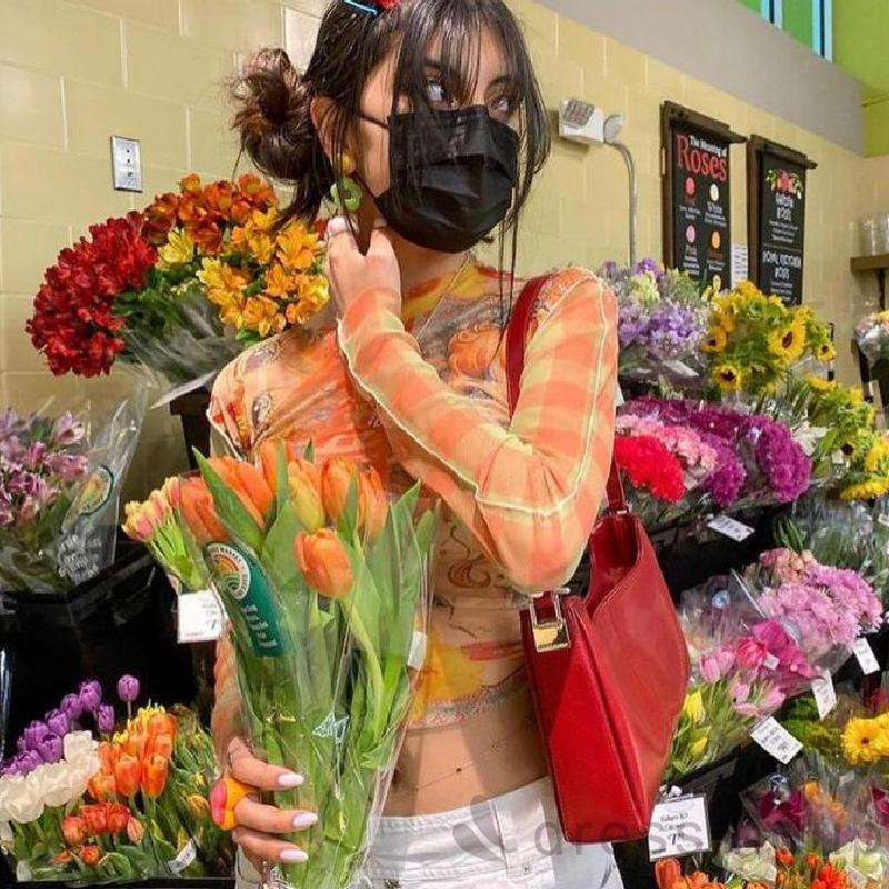 Áo thun tay dài cổ tròn in họa tiết hoạt hình phong cách thời trang cho nữ