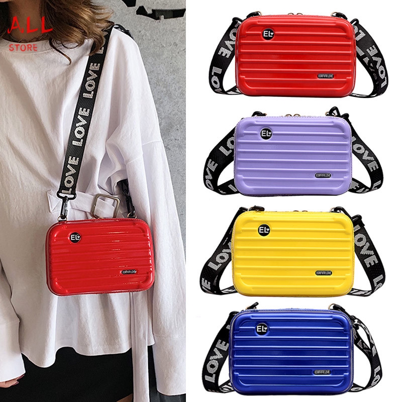 Túi đeo chéo hình vali mini với dây đeo bản rộng