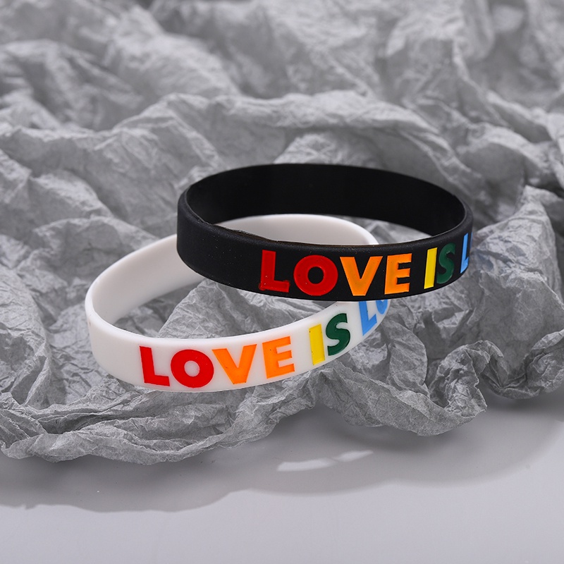 Vòng Tay Cặp Đôi Bằng Cao Su Mềm Màu Trắng Đen Chữ LOVE IS LOVE