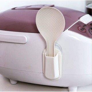 Dụng cụ để muỗng múc cơm có nút hít