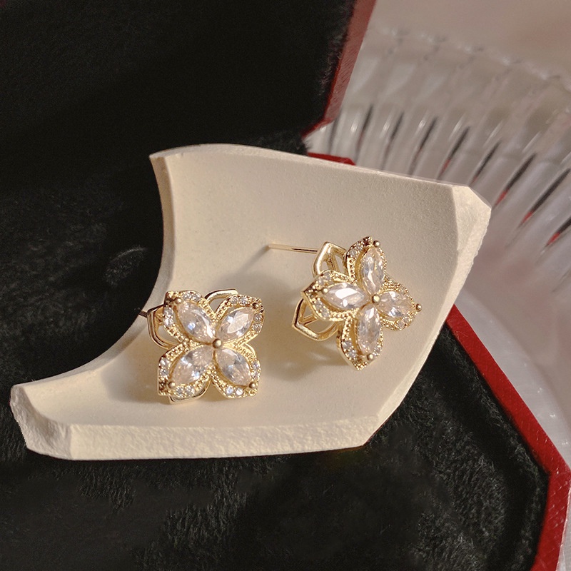 Dây chuyền/ Hoa tai/ Nhẫn mặt hoa bốn cánh đính đá zircon xoay được thời trang mùa hè dành cho bạn nữ