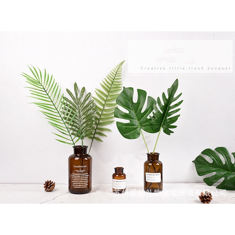 Cành lá cây nhựa trang trí lọ hoa