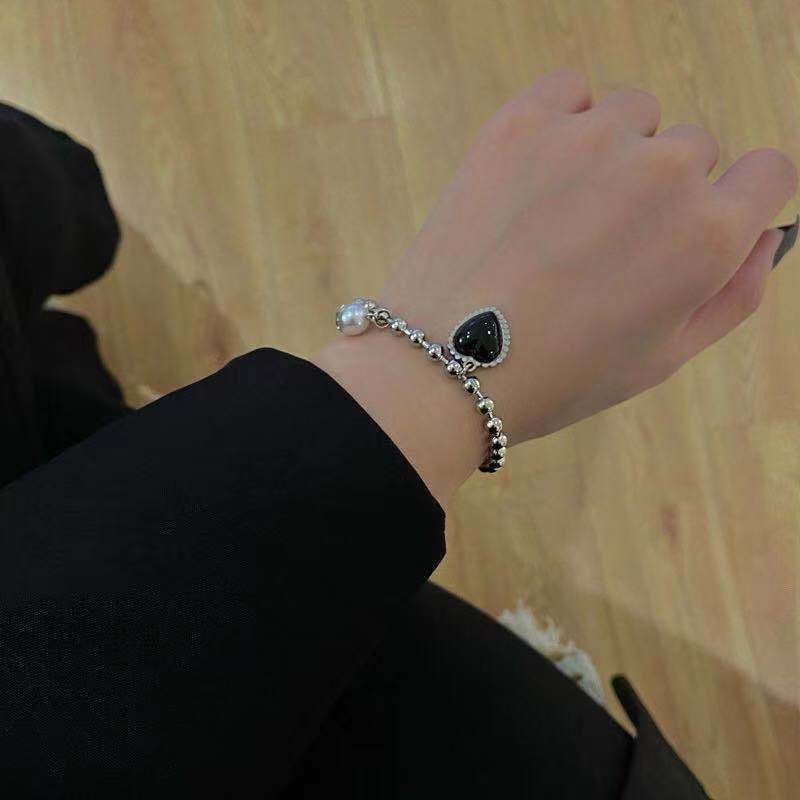 Vòng tay bằng thép titan màu đen đính ngọc trai nhân tạo phong cách cổ điển thời trang cho nữ