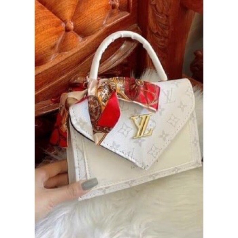 Túi  sách LV trẻ chung đeo chéo sách tay chất liệu da UP