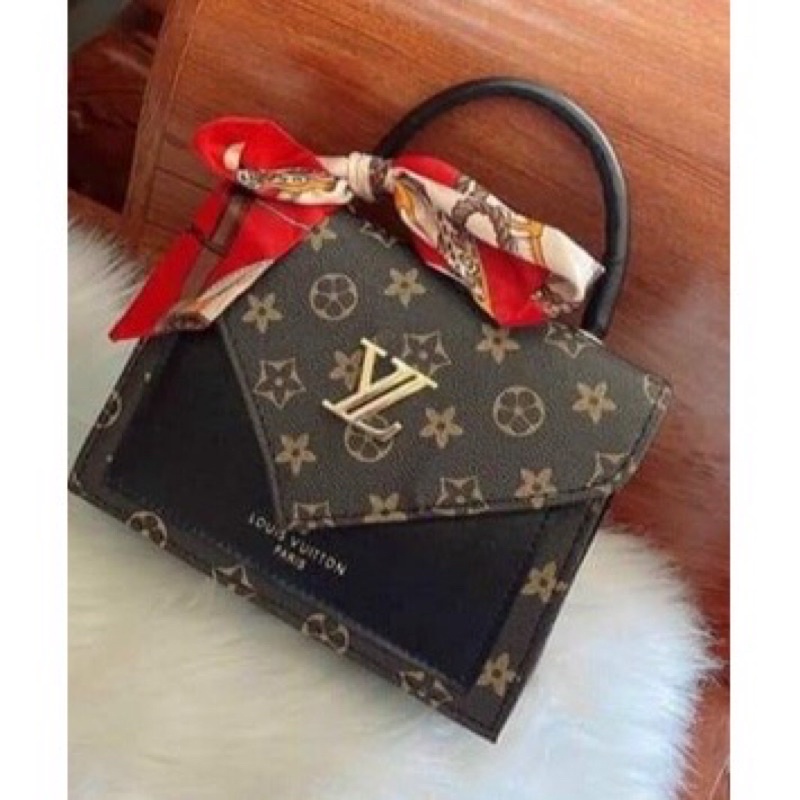 Túi  sách LV trẻ chung đeo chéo sách tay chất liệu da UP