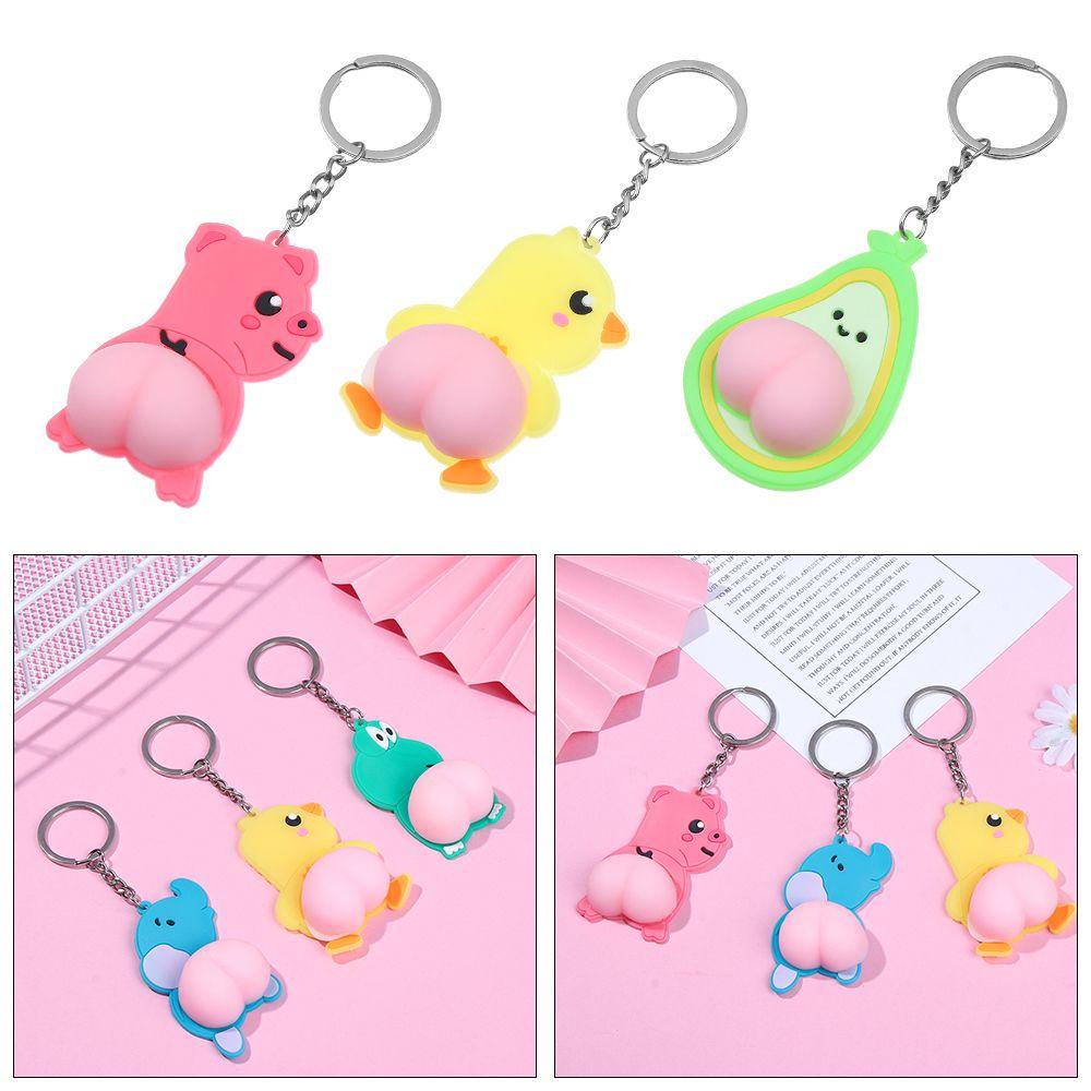 Móc Chìa Khóa Xe Hơi Bằng Silicon Co Giãn Chống Va Chạm Họa Tiết Hoạt Hình Màu Hồng