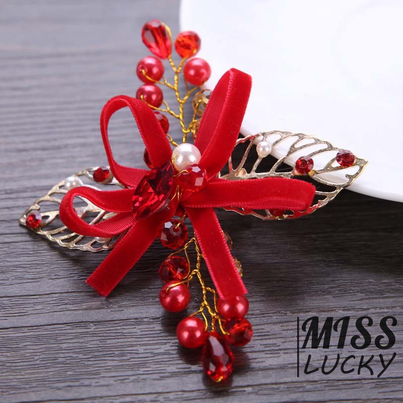 Kẹp tóc đính lá và ngọc giả xinh xắn dành cho nữ