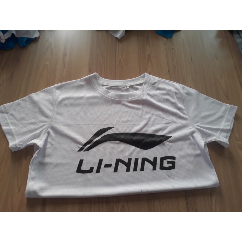 Áo tập cầu lông li.ning thông dụng toàn thế giới giá rẻ như tự may