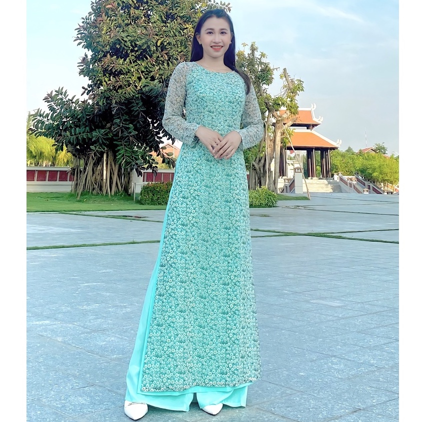 Áo dài hoa cúc nhí 4 tà màu xanh ngọc truyền thống may sẵn giáo viên