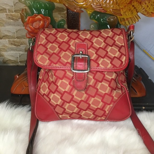 Đeo chéo 🧰:Hiệu Nine West Chất:Da thật phối vải dù KT:23*25 Độ mới cao(hàng si)