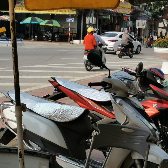 Tấm che yên xe máy/xe điện