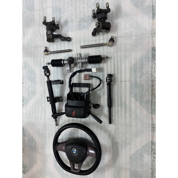 Bộ Hệ thống lái vô lăng xe 4 bánh đầy đủ,mai ơ tim ốc đo vuông 7cm,chéo 10cm,dùng chế xe 4 bánh lái vô lăng