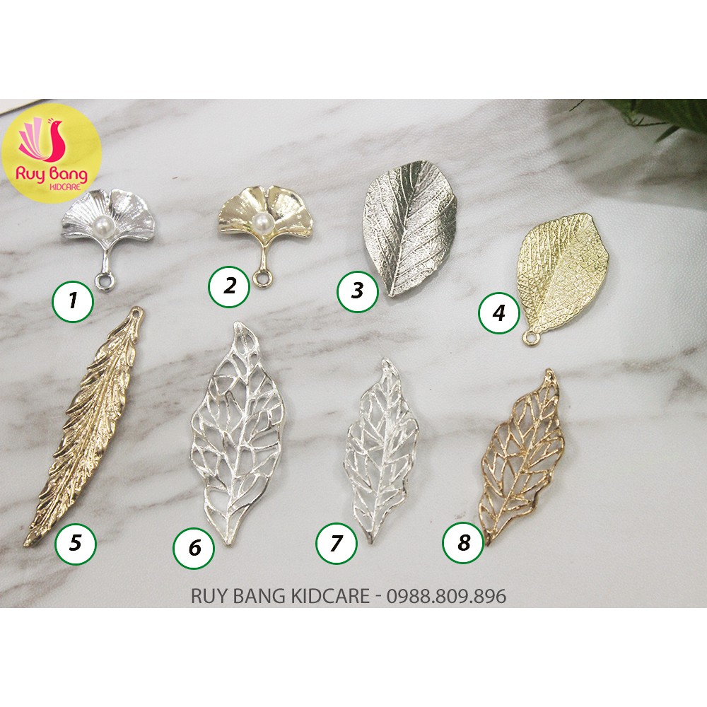 Cành lá kim loại, center đá đính hoa vải handmade