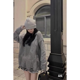 Áo len chrome heart rách