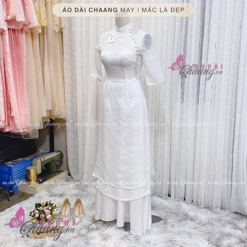 Áo Dài Trắng Cách Tân Nữ 4 Tà lệch Lụa Xước Đông Nhi Trắng Đính Ren Cúc Đẹp