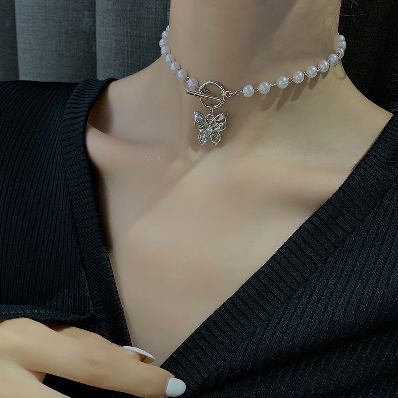 vòng cổ chocker ngọc màu trắng hoạ tiết hình nơ thiết kế xinh xăn cho nữ