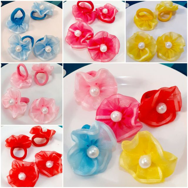 1 cặp cột tóc hình hoa cho bé