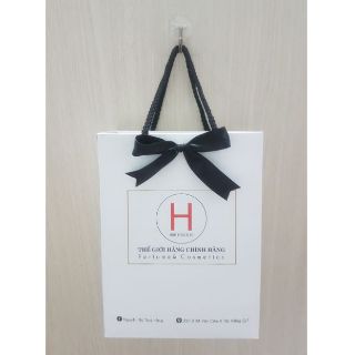 100 Túi in size M giấy dày đính nơ